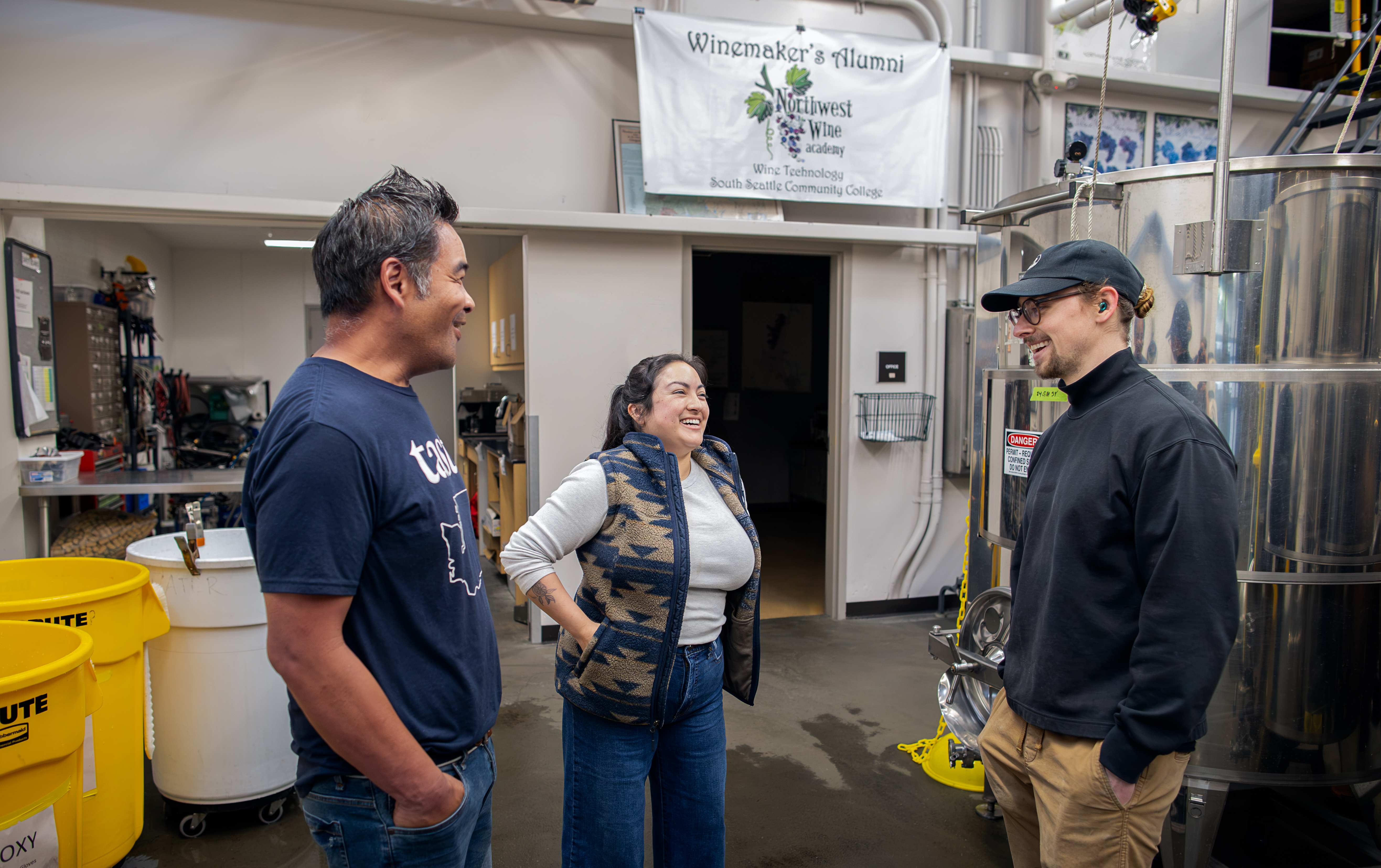 Students learning how to make wine